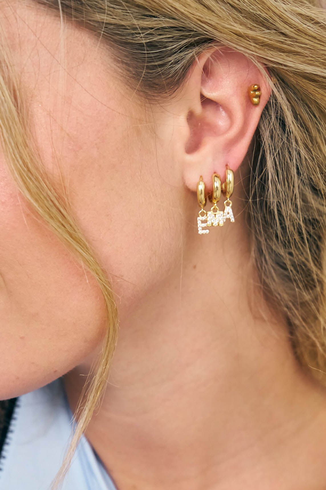 Little gold hoops with crystal initial charms