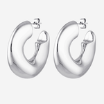 Our large silver hoops called Swell Hoops