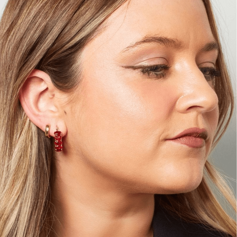 Red crystal earrings on two broke chicks