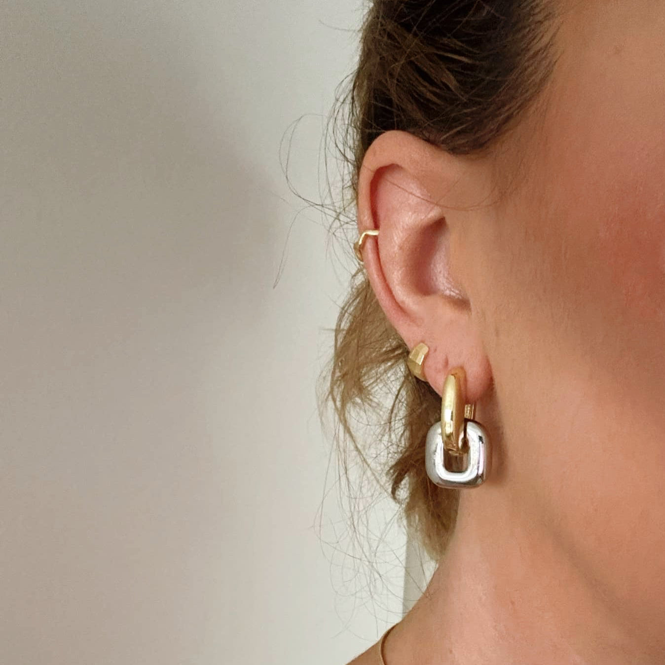 Annie wearing the mixed metal Demi earrings 