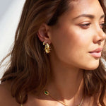 Teardrop shaped gold earrings