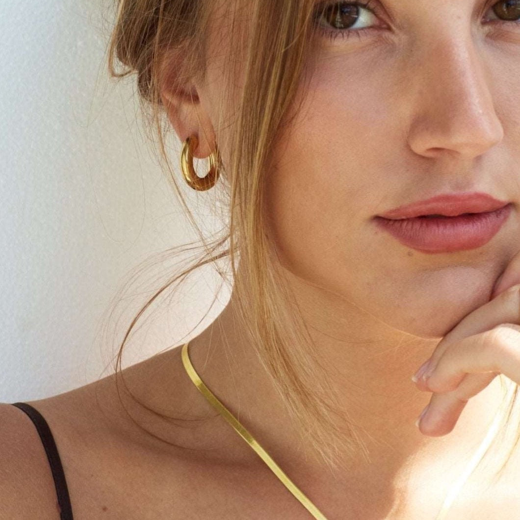 Solid everyday gold hoop earrings from Bixby and Co