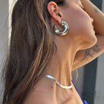 Model wearing our new big Swell hoops